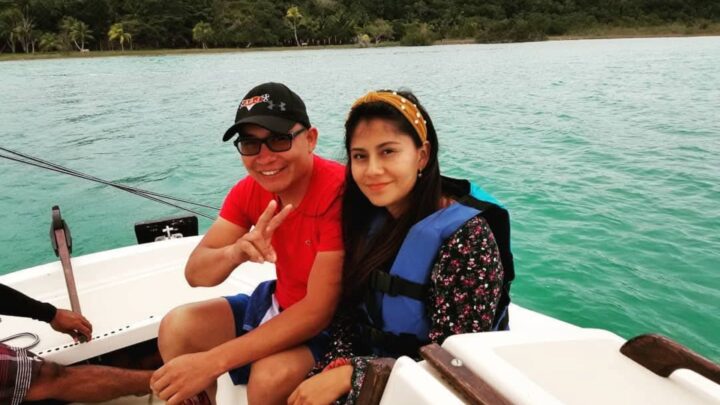 Private sailing experience on turquoise waters, enjoying a serene moment with a local guide by Carey Tours.