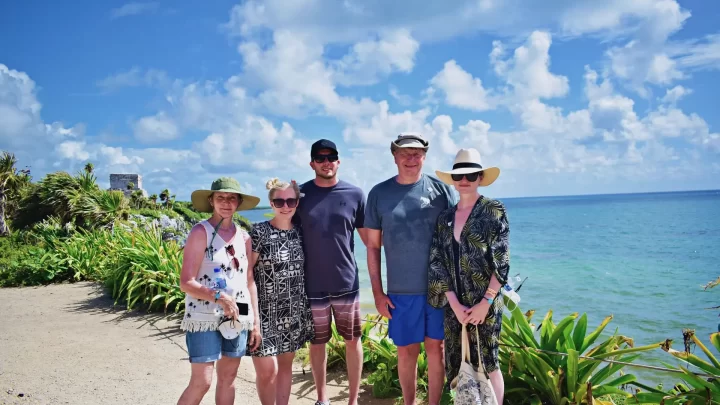 Private group enjoying a scenic view of the Caribbean Sea in Tulum during a relaxing day tour by Carey Tours